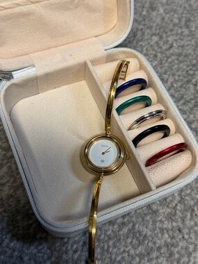 Gucci Gold Bangle Watch with Interchangeable Colored Bezels